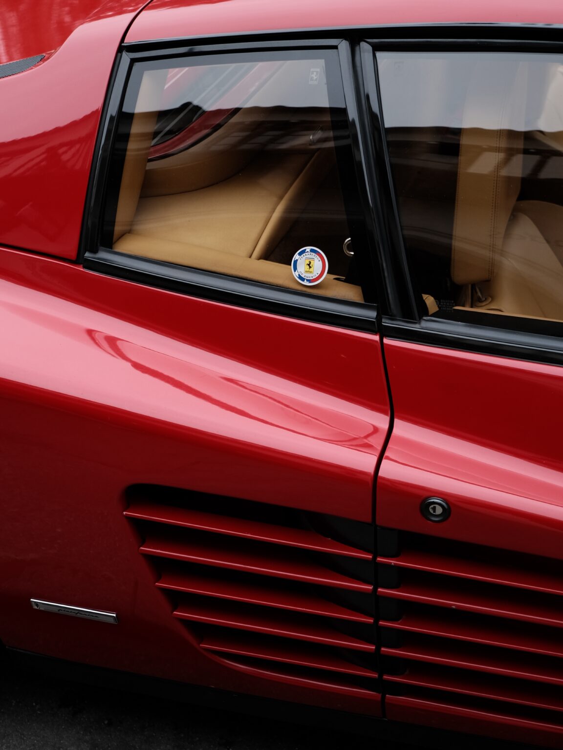 Rosso Corsa — Ferrari Testarossa side detail with Ferrari Club of America badge